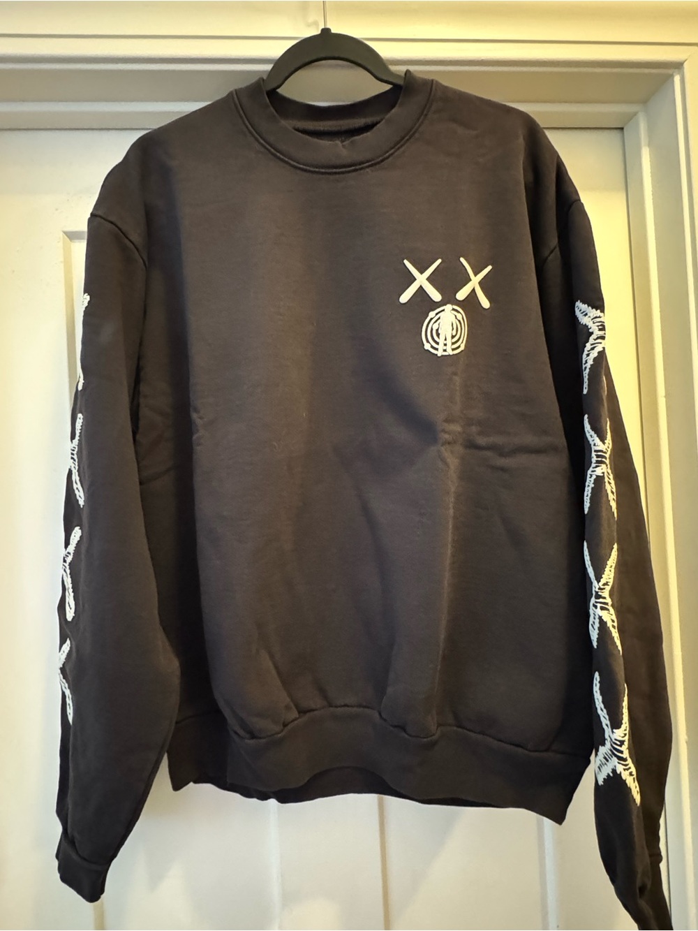 KAWS Kid Cudi collab. Black Crewneck Sweatshirt with White puff  print